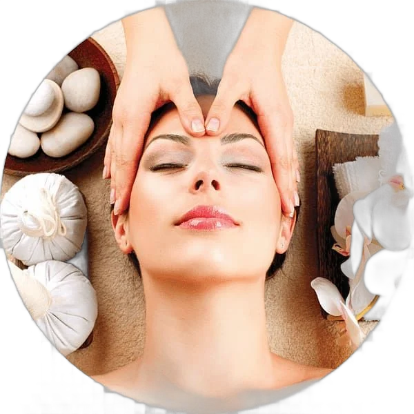 Woman relaxing during a facial massage